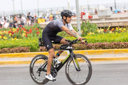 Photo for Athlete competing in the IRONMAN 70.3 LIMA, PERU - APRIL 23, 2023 - Royalty Free Image