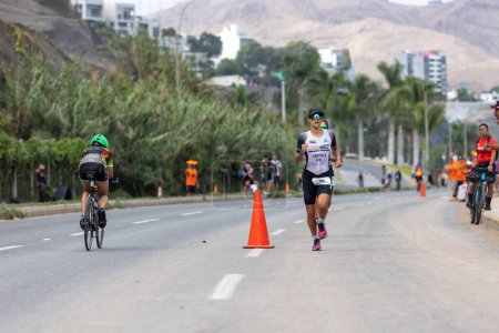 Photo for IRONMAN 70.3 LIMA, Athlete competing PERU - APRIL 23, 2023 - Royalty Free Image