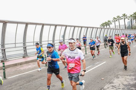 Photo for Lima, Peru - May 21, 2023: Athletes compete in the Lima Marathon 42K 2023. - Royalty Free Image