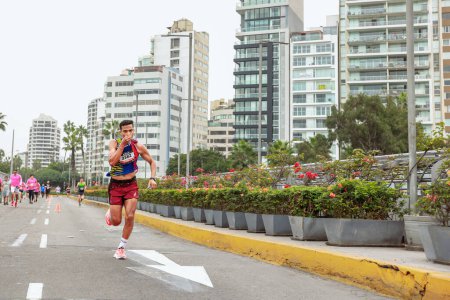 Photo for Athletes compete in the Lima Marathon 42K 2023. Running on the road, Lima Peru - Royalty Free Image