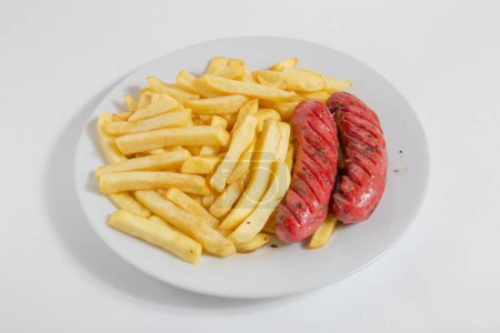Photo for Plate with tasty sausages, french fries and sausages - Royalty Free Image