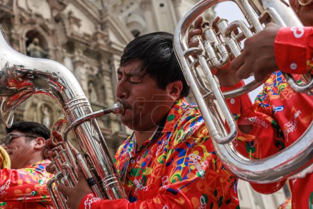 February 4, 2024, Lima PERU. Dancers and music bands in the parade of the festivity of the virgin of Candelaria in the main square of Lima.