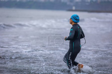 Photo for IRONMAN 70.3 Peru 2023. Athletes competing in the triathlon of Lima, Peru. - Royalty Free Image