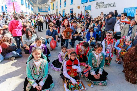Feast of the Virgen del Carmen in Paucartambo, Cusco. Dancers and the public celebrate at the feast of the Virgen del Carmen.