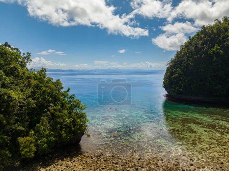 Photo for Beautiful panoramic aerial view of open sea surface. Coral reefs in clear water. Seascape. Bucas Grande Island. Mindanao, Philippines. - Royalty Free Image