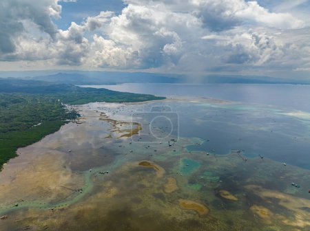 Tropical Island and Fish Farm over the sea in the Philippines. Mindanao..