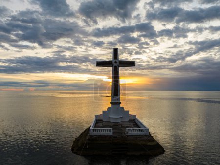 Sunken Cemetery in Camiguin Island. Sunset and clouds backgroud. Philippines.