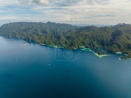 Lagoons with splendid limestone rocks. Blue sea and turquoise lagoons in Coron, Palawan. Philippines.