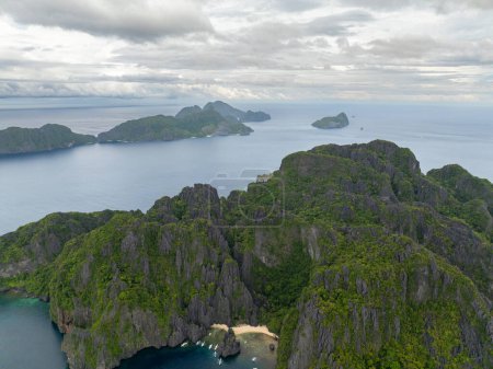 Aerial view of Lagoon and White Sand Beach in Miniloc Island, El Nido, Philippines.