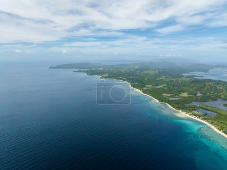 Tropical coastline with white sandy beach. Agmanic Lake in Santa Fe, Tablas, Romblon. Philippines.