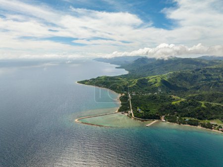 Aerial view of San Agustin with turquoise sea water and coral reefs. Tablas Island. Romblon, Philippines.