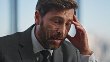 Tired businessman explaining call mistakes closeup. Stressed manager arguing discussing financial results in office remotely. Nervous irritated man ceo talking partners resolving problems on meeting