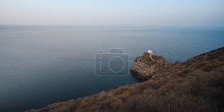 Photo for Panoramic view of the beautiful typical church of Kastro by the aegean sea on the greek island of Sifnos in the Cyclades - Royalty Free Image