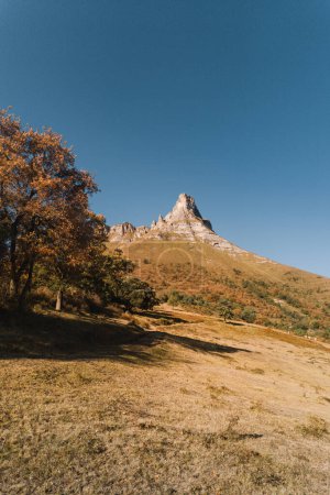 Photo for Pico Tologorri in the Gorobel mountain range on a sunny autumn day from Venta Fria, Lendonio - Royalty Free Image