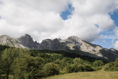 Photo for Horizontal landscape of the rocky peaks of the mampodre mountain massif, in Leon, in summer - Royalty Free Image