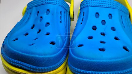 Photo for The appearance of blue and yellow children's sandals - Royalty Free Image