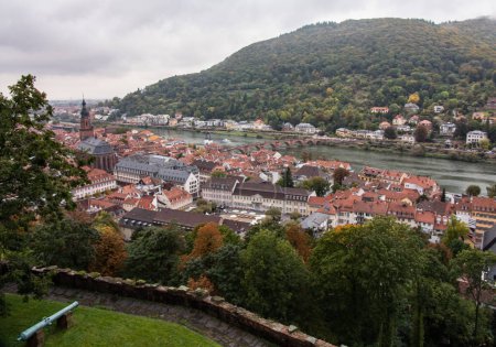 Photo for Heidelberg, Baden-Wuerttemberg, Germany Oktober 2021. Heidelberg cityscape, view from above of the old town and the Protestant Church of the Holy Spirit. - Royalty Free Image