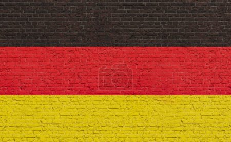 Die Farben der Deutschland-Flagge auf eine Ziegelwand gemalt. Nationalfarben, Land, Banner, Regierung, deutsche Kultur, Politik.