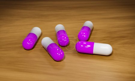 Pink capsules, medical pills on a wooden table. Industrial production of medicine, antibiotica or other drugs.