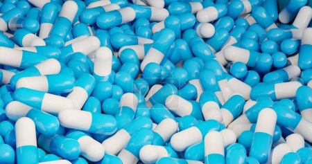 Pilules médicales bleues, capsules dans une boîte. Production industrielle de médicaments, antibiotiques ou autres médicaments.