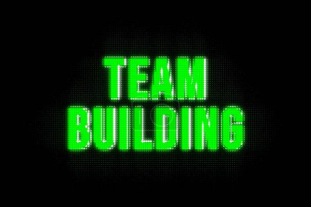 Team Building. Bannière en majuscules vertes. Le texte, le team building, éclairé. Travail d'équipe, ensemble, communauté, stratégie, esprit d'équipe.