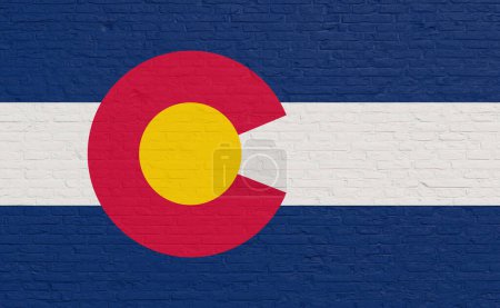 Colorado flag colors painted on a brick wall. National colors, US state, country, banner, government, Colorado culture, politics, United States, tourism.