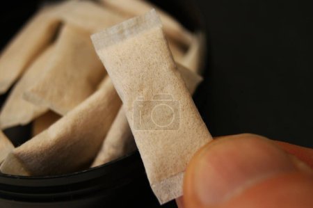 Close-up of the nicotine pouches. The use of nicotine pads.