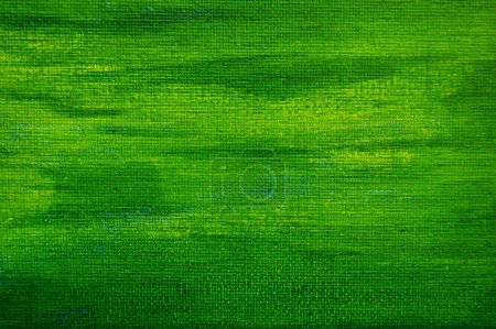 Textur der grünen Leinwand. Grüner abstrakter Hintergrund.