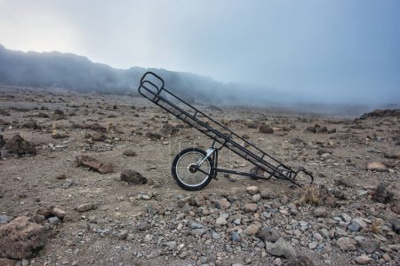 Photo for Unicycle used for emergency evacuation to ferry injured hikers to lower camps, unique to Kilimanjaro, Tanzania - Royalty Free Image