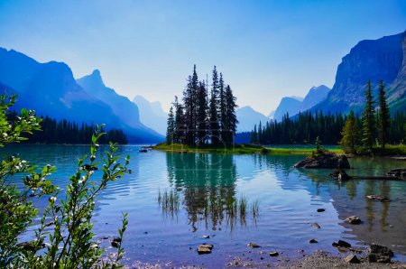 Photo for World famous and Iconic Spirit Island  a holy place for the Stoney Nakoda First nation  on Maligne Lake in Jasper National Park in the Canada rockies - Royalty Free Image
