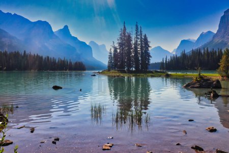 Photo for World famous and Iconic Spirit Island  a holy place for the Stoney Nakoda First nation  on Maligne Lake in Jasper National Park in the Canada rockies - Royalty Free Image