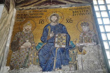 Photo for Byzantine mosaic of Jesus Christ sitting on throne with Empress Zoe and Emperor Constantine IX Monomachus in Hagia Sophia, UNESCO world heritage church and mosque in Istanbul, Turkey - Royalty Free Image