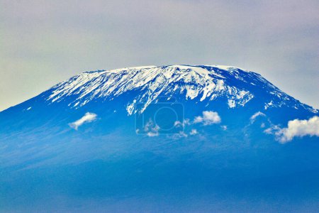 The famous melting glaciers in the Southern icefields of Mount Kilimanjaro's Kibo crater are seen in this close up taken from the Amboseli national park, Kenya