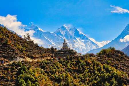 Mount Everest and Lhotse with the Tenzing Memorial Chorten in the foreground present a memorable image for trekkers on the Everest base camp trek near Namche Bazaar,Nepal