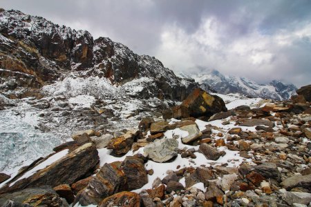 Glaciers and boulder field at the base of the Cho La pass at 5400 meters at the foot of Mount Cholatse in direction of Dzonghla village in the Khumbu valley, Nepal