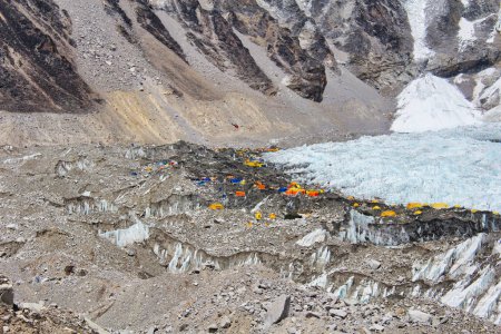 Everest Base Camp climbers and expedition tents and the base of the Khumbu icefall seen from the top of Kala Pathar on the Khumbu glacier in preparation for climbing Everest in Khumbu, Nepal