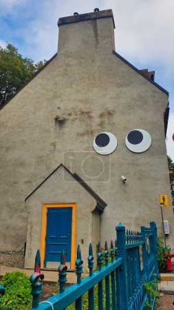 Cute and Quirky sign of a wall with eyes  in the Quebec shopping district Quartier Petit Champlain in Quebec city, the capital of Quebec province,Canada