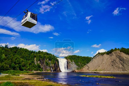 View of the Cable car or Gondola operated by the Montmorency Park with a spectacular view of the Montmorency waterfalls on a bright summer day near Quebec city, the capital of Quebec province,Canada