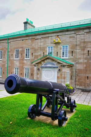 A World War Gun with a view of the Headquarters of the Royal 22nd Regiment, the largest francophone regiment of the Canadian armed forces at the Citadel of Quebec in Quebec city,Canada