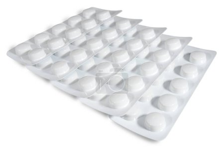 Foto de Tablets in a blister pack on white background. Medicines and healthcare - Imagen libre de derechos