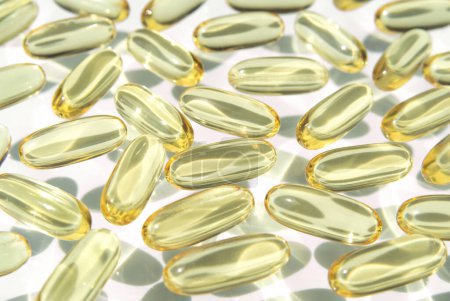 Fish oil softgel capsules. Omega 3 food supplement. Medicines and healthcare