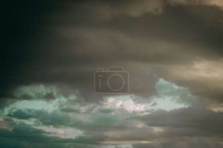Photo for Dark rain clouds, thunderstorm. Soft selective focus. - Royalty Free Image