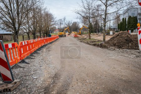 Photo for Repair works, road construction, stone road. In spring. - Royalty Free Image