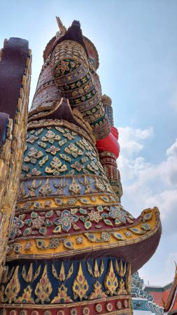 Statue of Yaksha or giants of the Temple of the Emerald Buddha in Bangkok, Thailand.  