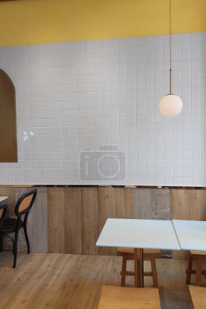 White Ceramic Tiles Adorning the Walls of a Caf in Bangkok.