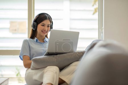 Photo for Asian girl student online learning class study online video call zoom teacher, Happy asian girl learn english language online with computer laptop - Royalty Free Image
