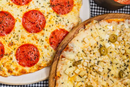 Photo for Delicious heart of palm vegetarian pizza with mozzarella cheese and pepperoni pizza, baked, pizza at home. - Royalty Free Image