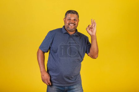 Photo for Brazilian black man, adult smiling, ok sign, all great, wonderful. - Royalty Free Image