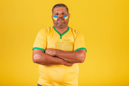 Photo for Brazilian black man, soccer fan from Brazil. arms crossed. Optimistic. for real. - Royalty Free Image