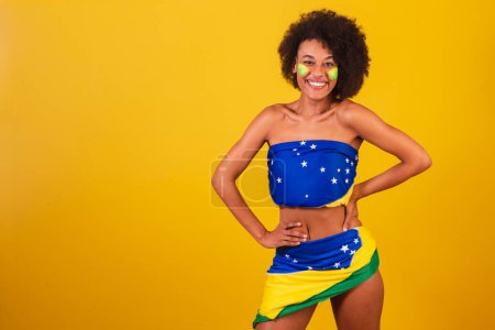 Photo for Young black woman brazilian soccer fan. hands on waist - Royalty Free Image